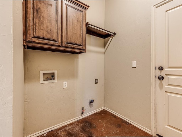 4305 NW 164th Ter, Edmond, OK 73013 - laundry room featuring washer hookup, hookup for an electric dryer, hookup for a gas dryer, baseboards, and cabinet space