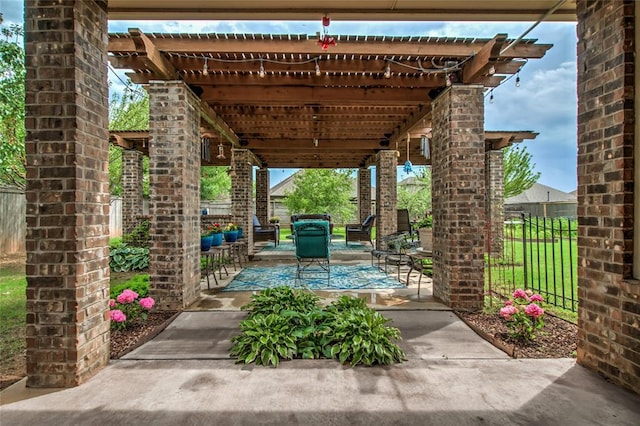 2717 Cordgrass Ln, Edmond, OK 73013 - view of patio / terrace featuring a pergola and outdoor lounge area