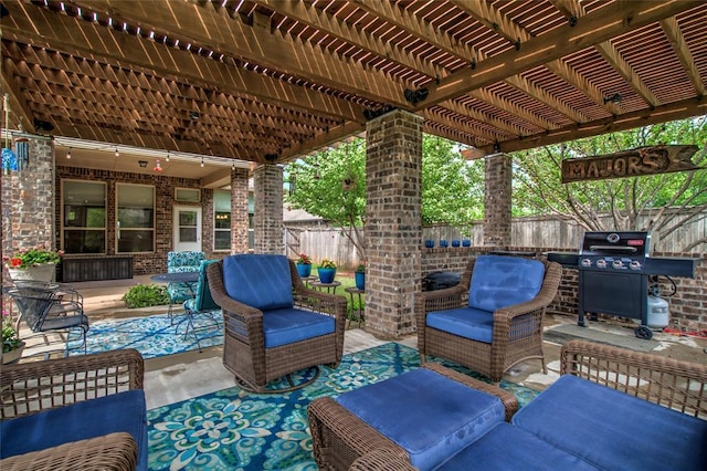 2717 Cordgrass Ln, Edmond, OK 73013 - fenced backyard with a grill, outdoor lounge area, a patio, and a pergola