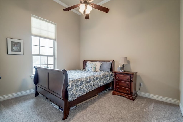 2717 Cordgrass Ln, Edmond, OK 73013 - carpeted bedroom with baseboards, ornamental molding, and a ceiling fan