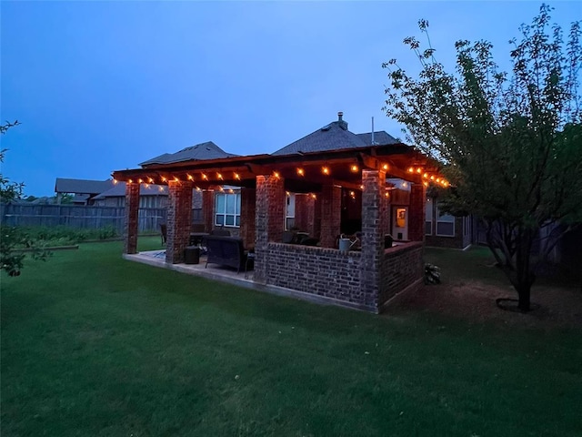 2717 Cordgrass Ln, Edmond, OK 73013 - back of property featuring a patio