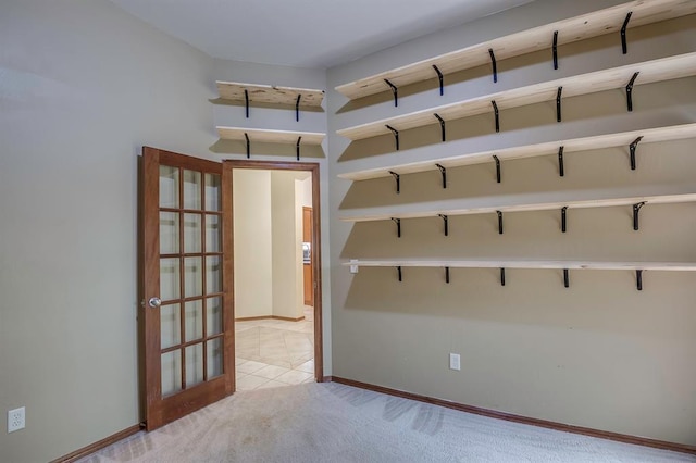 832 Elm Creek Dr, Moore, OK 73160 - spare room with baseboards and light carpet