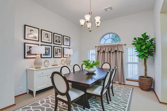832 Elm Creek Dr, Moore, OK 73160 - dining room with a chandelier and baseboards