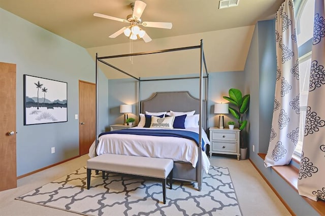 832 Elm Creek Dr, Moore, OK 73160 - carpeted bedroom with lofted ceiling, baseboards, and ceiling fan