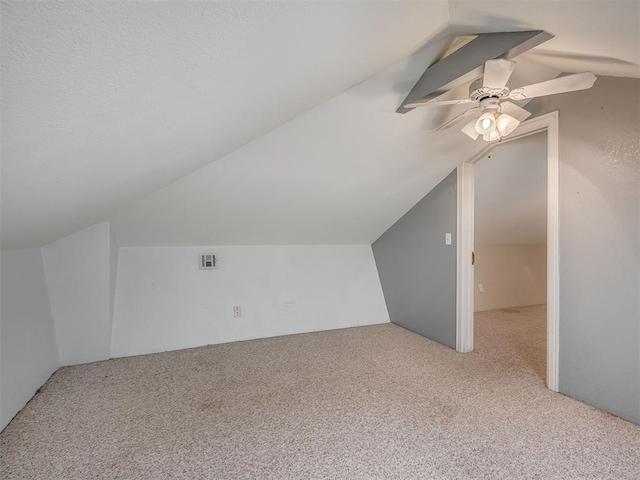 2604 Jeannes Trl, Edmond, OK 73012 - additional living space featuring carpet floors, lofted ceiling, and a ceiling fan