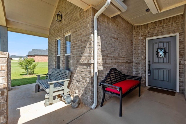 29731 Jade St, Cashion, OK 73016 - view of exterior entry featuring brick siding