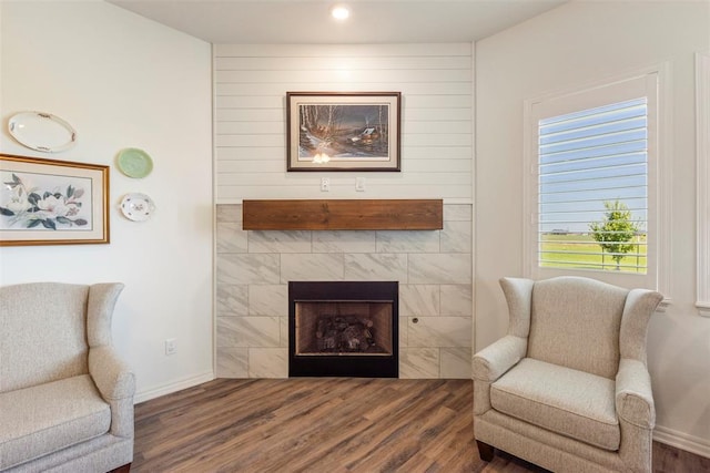 29731 Jade St, Cashion, OK 73016 - sitting room with wood finished floors, a fireplace, and recessed lighting