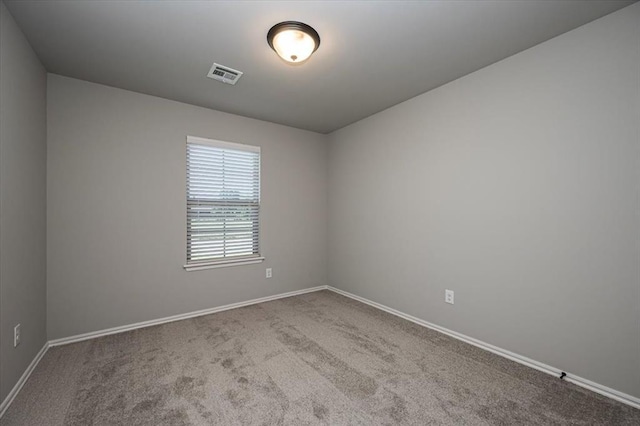 2000 W Flintlock Way, Mustang, OK 73065 - spare room with carpet flooring and baseboards