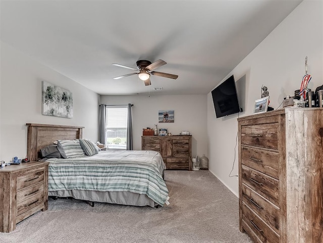 42173 N Max Henry Dr, Shawnee, OK 74804 - bedroom featuring light carpet and ceiling fan