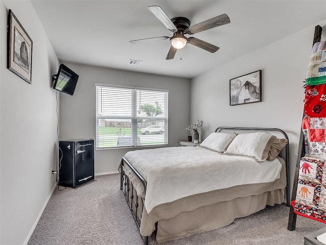42173 N Max Henry Dr, Shawnee, OK 74804 - bedroom featuring light colored carpet, baseboards, and a ceiling fan