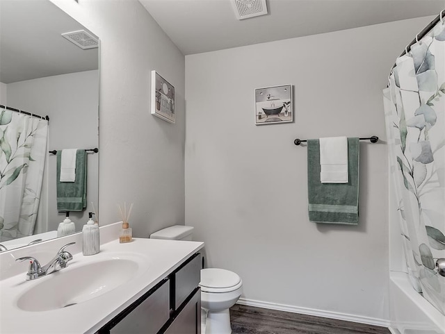 42173 N Max Henry Dr, Shawnee, OK 74804 - full bath with vanity, toilet, wood finished floors, and baseboards