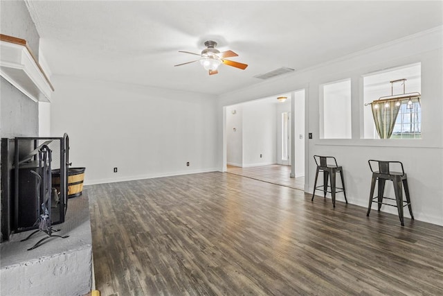 2020 Lyle Rd, Weatherford, OK 73096 - living area featuring wood finished floors, a ceiling fan, and baseboards