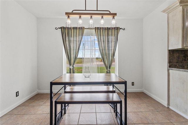 2020 Lyle Rd, Weatherford, OK 73096 - dining space with light tile patterned flooring and baseboards