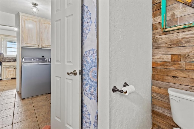 2020 Lyle Rd, Weatherford, OK 73096 - full bathroom with washer / dryer, toilet, tile patterned flooring, and a textured wall