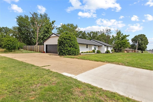 2020 Lyle Rd, Weatherford, OK 73096 - view of home's exterior with concrete driveway and a garage