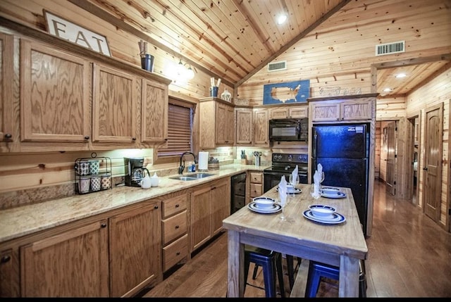 56 Muscadine Trl, Broken Bow, OK 74728 - kitchen featuring black appliances, a sink, wood walls, high vaulted ceiling, and dark wood-type flooring