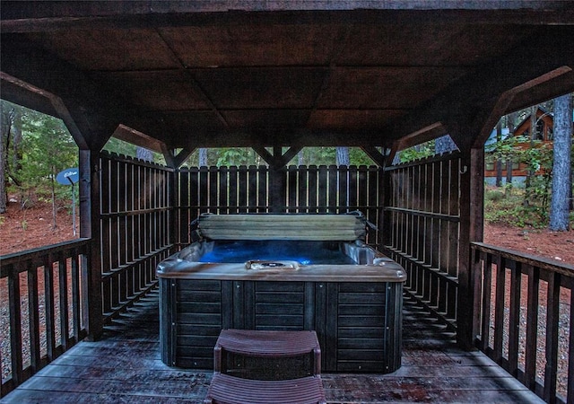 56 Muscadine Trl, Broken Bow, OK 74728 - wooden deck featuring a hot tub
