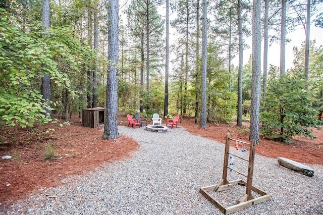 56 Muscadine Trl, Broken Bow, OK 74728 - view of community with an outdoor fire pit