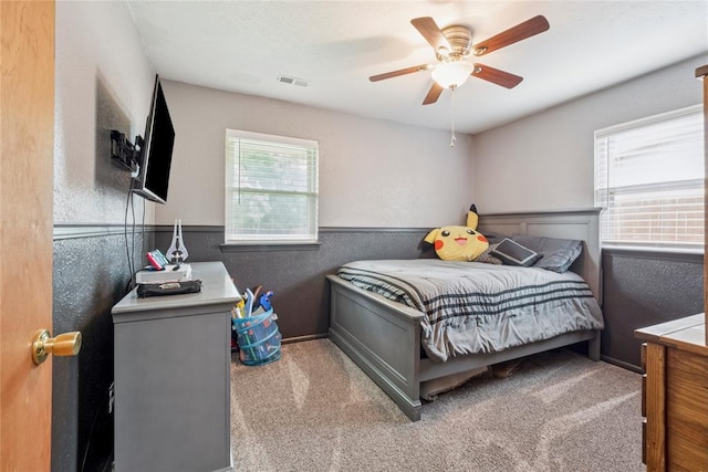 201 Vine St, Yukon, OK 73099 - carpeted bedroom with a ceiling fan