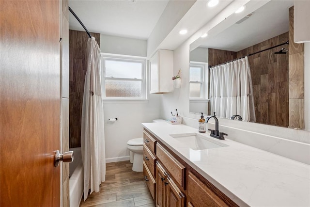 201 Vine St, Yukon, OK 73099 - full bathroom featuring vanity, toilet, recessed lighting, baseboards, and shower / bath combo with shower curtain
