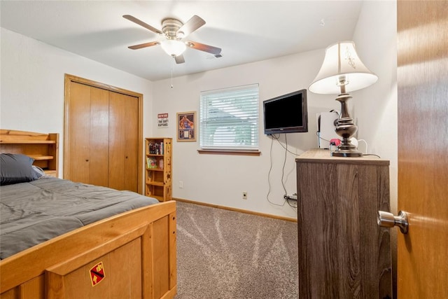 201 Vine St, Yukon, OK 73099 - carpeted bedroom featuring baseboards, ceiling fan, and a closet