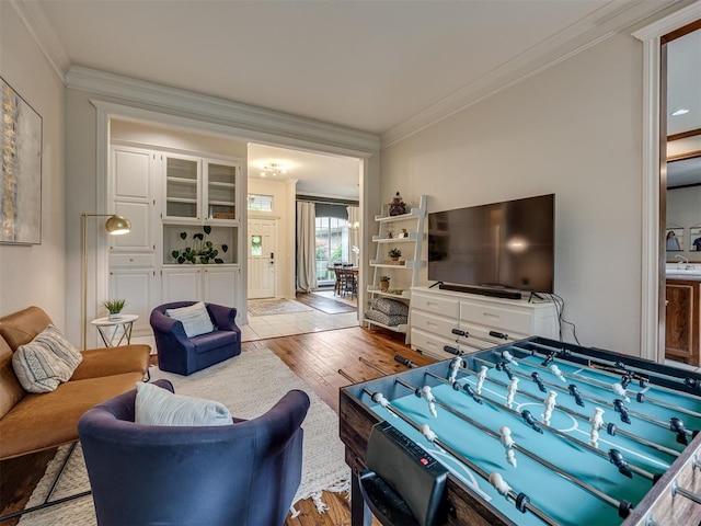 13925 Middleberry Rd, Edmond, OK 73013 - living area featuring hardwood / wood-style floors and crown molding