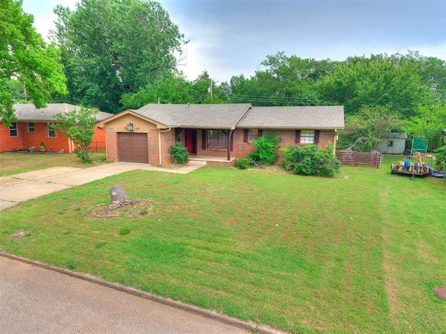 1545 N Pennsylvania Ave, Shawnee, OK 74804 - ranch-style home featuring a garage, concrete driveway, a front yard, brick siding, and covered porch