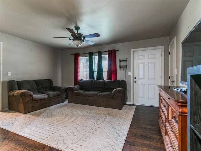 1545 N Pennsylvania Ave, Shawnee, OK 74804 - living room featuring a ceiling fan and dark wood finished floors