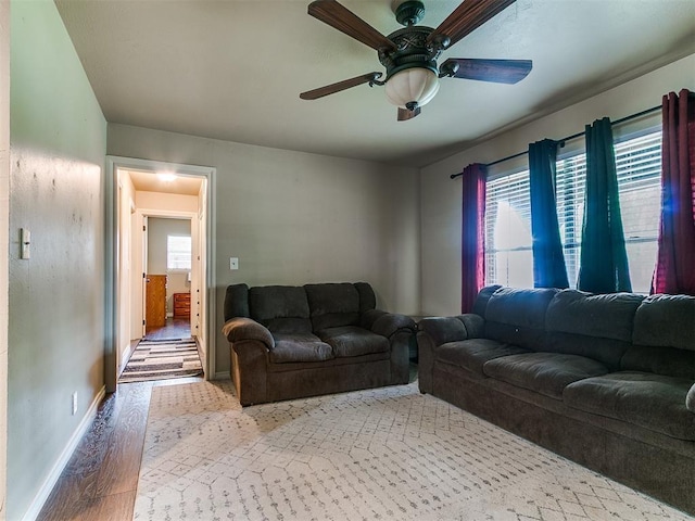 1545 N Pennsylvania Ave, Shawnee, OK 74804 - living room featuring wood finished floors, a ceiling fan, and baseboards