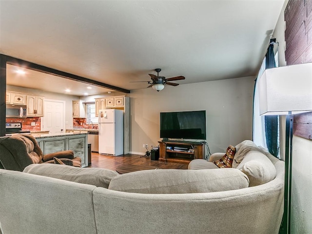 1545 N Pennsylvania Ave, Shawnee, OK 74804 - living area featuring a ceiling fan, dark wood-type flooring, baseboards, and recessed lighting