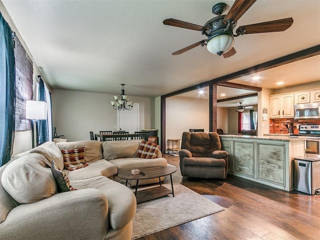 1545 N Pennsylvania Ave, Shawnee, OK 74804 - living room featuring a ceiling fan, a chandelier, dark wood-style flooring, and recessed lighting
