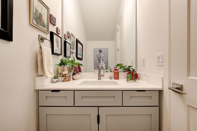 571 S Fretz Ave, Edmond, OK 73003 - bathroom with vanity and lofted ceiling