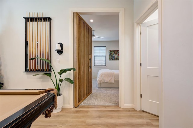 571 S Fretz Ave, Edmond, OK 73003 - corridor with light wood finished floors, baseboards, and recessed lighting