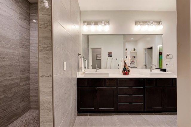 571 S Fretz Ave, Edmond, OK 73003 - bathroom featuring double vanity and tile patterned floors