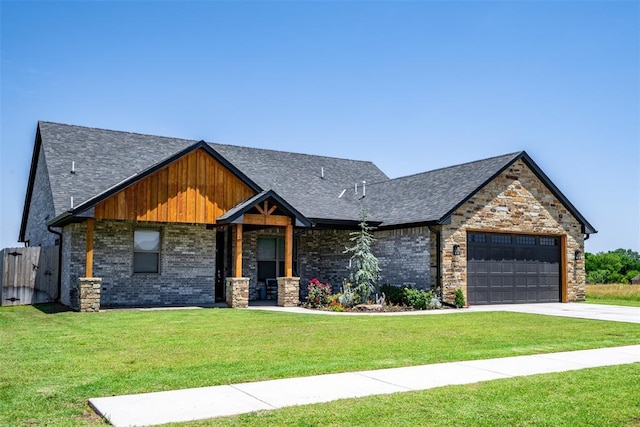 8725 NW Kensington Pl, Lawton, OK 73505 - view of front of home featuring a garage, a front lawn, driveway, and a shingled roof