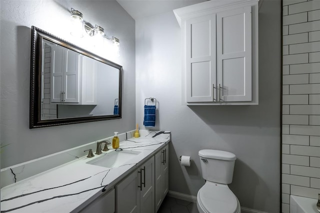 8725 NW Kensington Pl, Lawton, OK 73505 - full bath featuring vanity, toilet, and baseboards