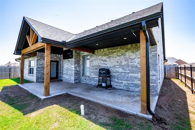 8725 NW Kensington Pl, Lawton, OK 73505 - fenced backyard with a patio area and grilling area