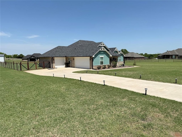 2320 Dixie Dr, Blanchard, OK 73010 - view of front facade with an attached garage, driveway, and roof with shingles