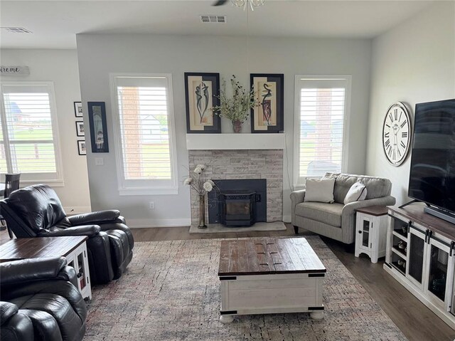 2320 Dixie Dr, Blanchard, OK 73010 - living area featuring dark wood-style floors and healthy amount of natural light