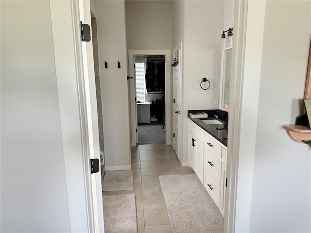 2320 Dixie Dr, Blanchard, OK 73010 - bathroom featuring vanity, tile patterned flooring, and baseboards