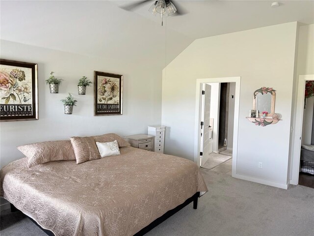 2320 Dixie Dr, Blanchard, OK 73010 - carpeted bedroom featuring vaulted ceiling, connected bathroom, and baseboards