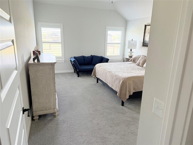 2320 Dixie Dr, Blanchard, OK 73010 - carpeted bedroom with vaulted ceiling and baseboards