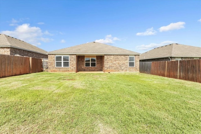 9912 Ruger Rd, Yukon, OK 73099 - rear view of property featuring brick siding