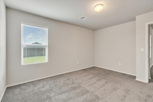 9912 Ruger Rd, Yukon, OK 73099 - carpeted empty room featuring baseboards