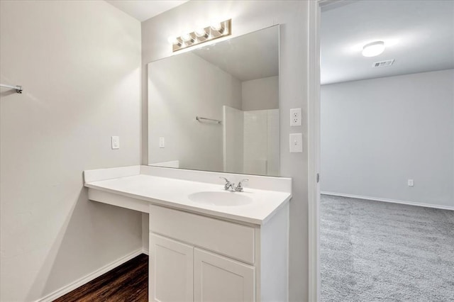 9912 Ruger Rd, Yukon, OK 73099 - full bathroom featuring vanity and baseboards