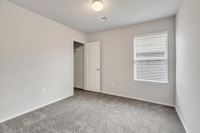 9912 Ruger Rd, Yukon, OK 73099 - unfurnished bedroom featuring carpet flooring and baseboards