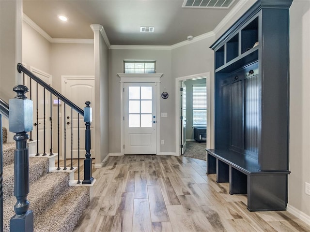 3317 Open Prairie Trl, Yukon, OK 73099 - entryway featuring wood finished floors, ornamental molding, baseboards, stairway, and recessed lighting