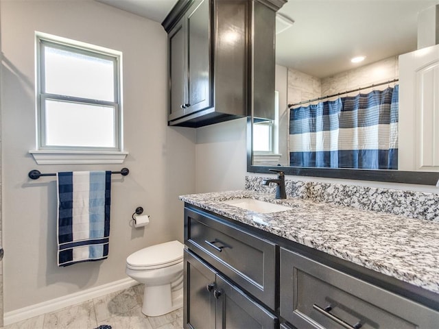 3317 Open Prairie Trl, Yukon, OK 73099 - full bath with toilet, vanity, baseboards, a shower with shower curtain, and marble finish flooring