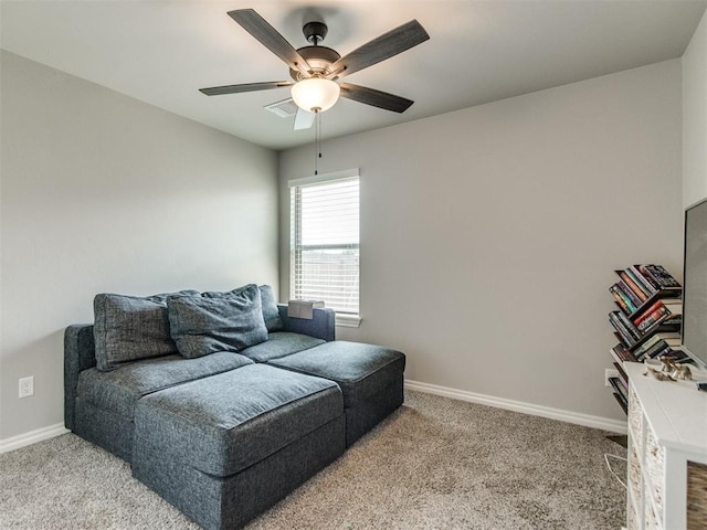 3317 Open Prairie Trl, Yukon, OK 73099 - living area with light colored carpet, a ceiling fan, and baseboards