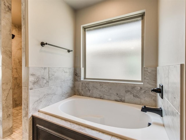 3317 Open Prairie Trl, Yukon, OK 73099 - full bathroom featuring a bath and a tile shower